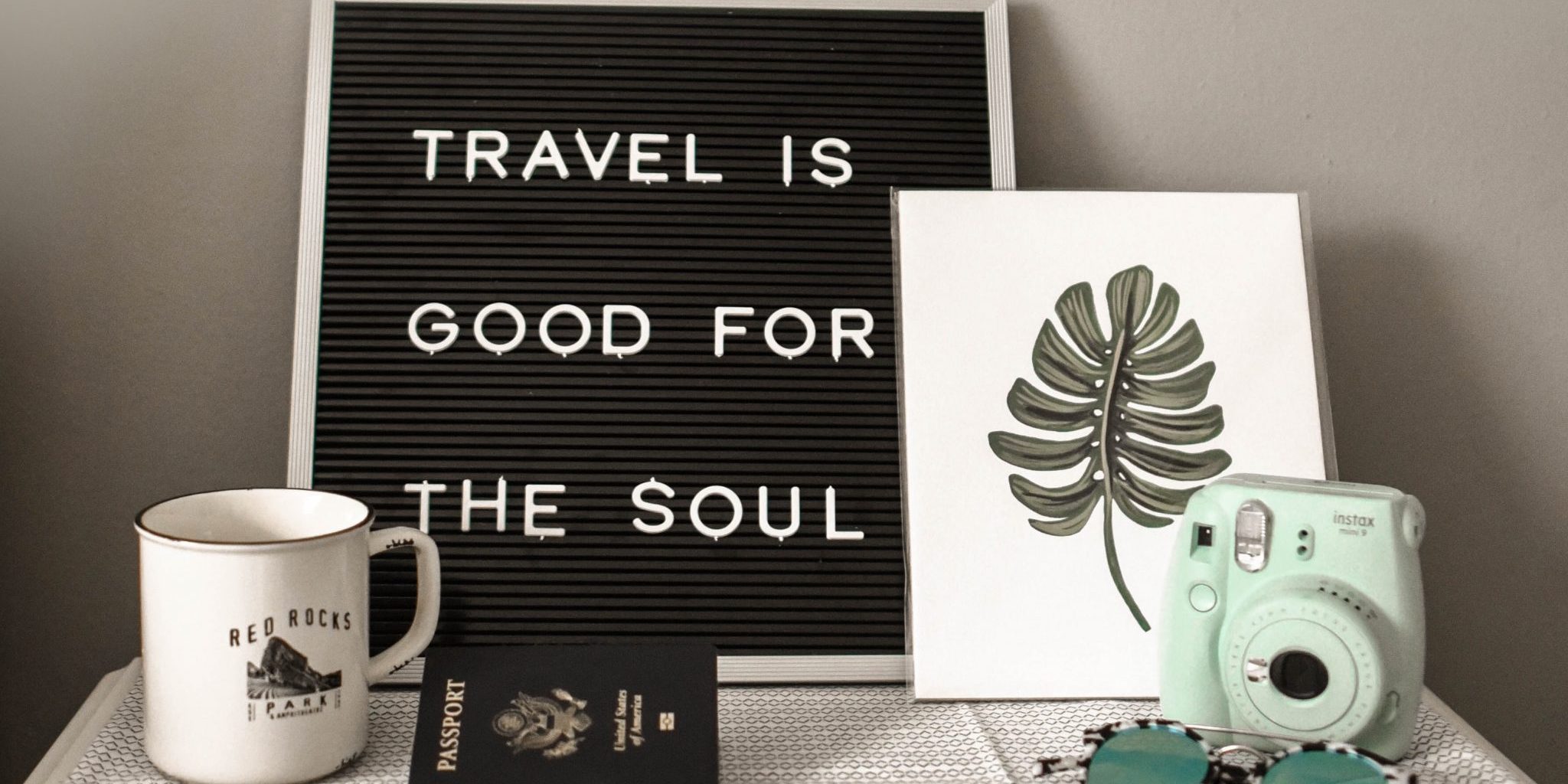 White table with decorations such as cup glasses frame