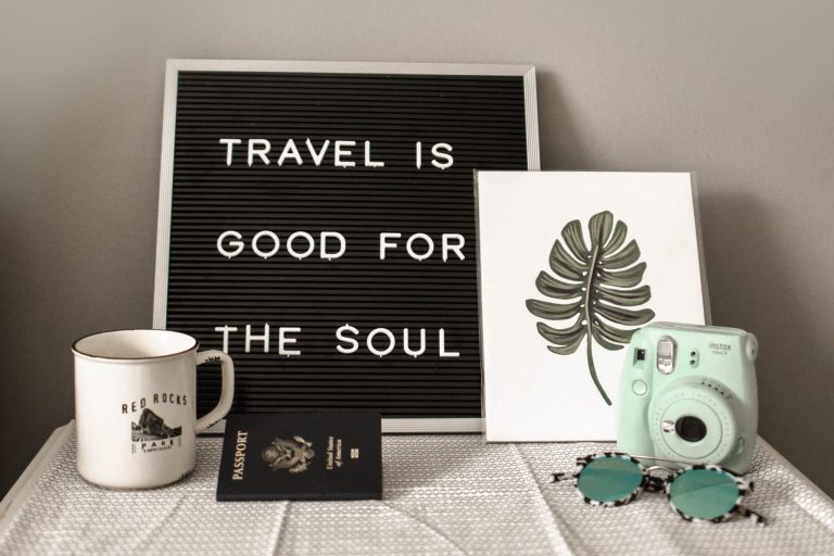 White table with decorations such as cup glasses frame