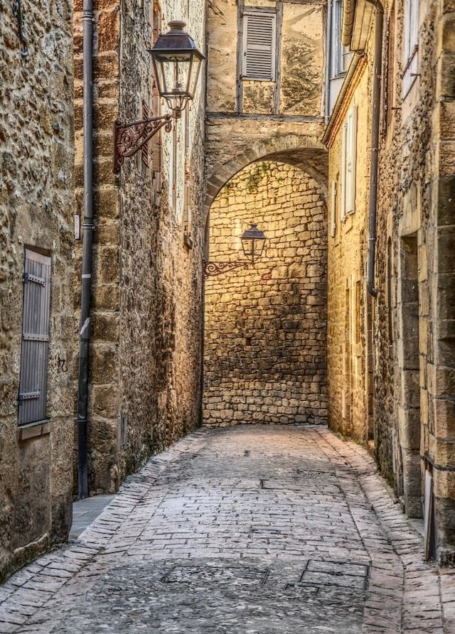 a narrow cobbled street in dordogne