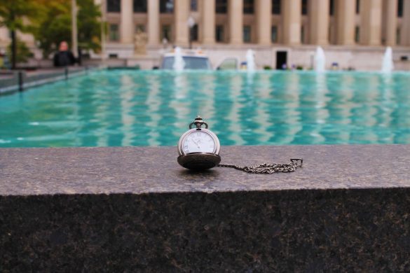 a watch near a fountain
