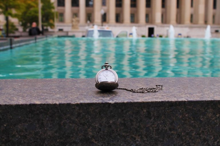 a watch near a fountain