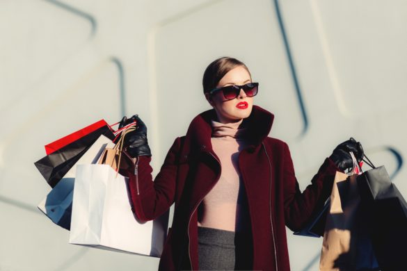 a woman with shopping bags in europe