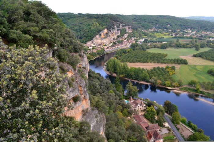 cycling in spring Dordogne village river view